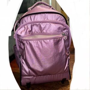 Kipling pink/purple large rolling backpack